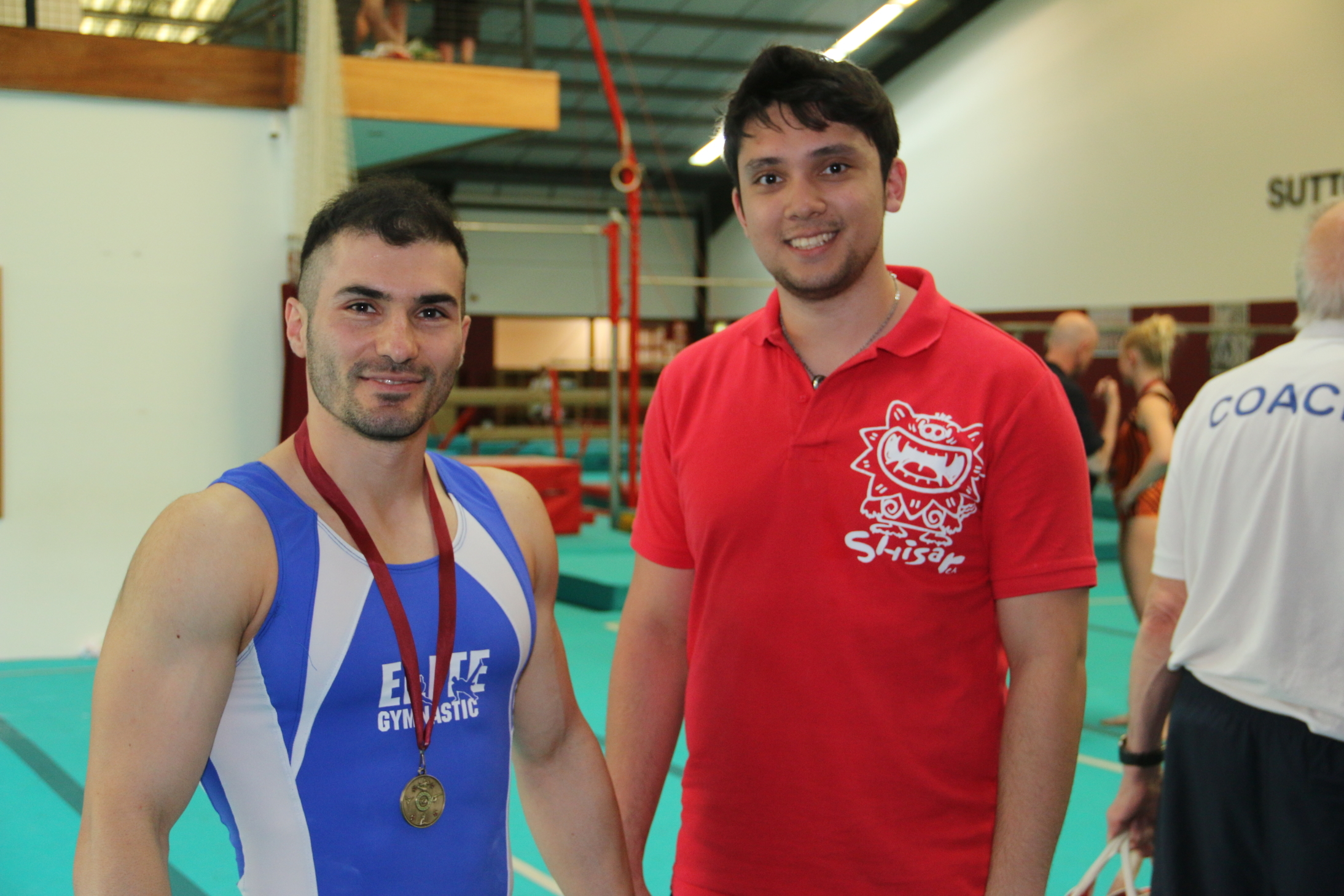 Stefan Kolimechkov and Damon DuCasse at the Sutton Gymnastics Academy Adults Competition 2016
